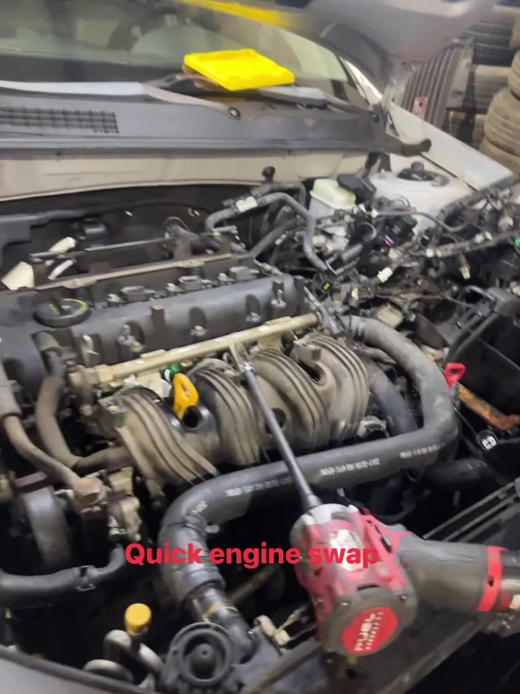 Engine bay mid-swap. Diagnosis first, parts second.